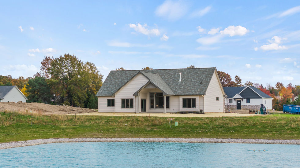 Pond Lot - Pond View - Home on Pond - Quality Crafted Homes - Back Exterior of Home