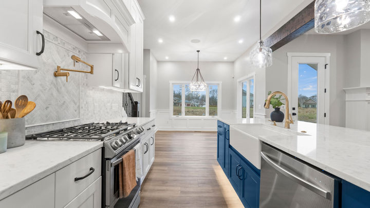 Custom Kitchen - White Kitchen Cabinets - Navy Cabinets - Backsplash - Farmhouse Sink - Custom Home - Quality Crafted Homes