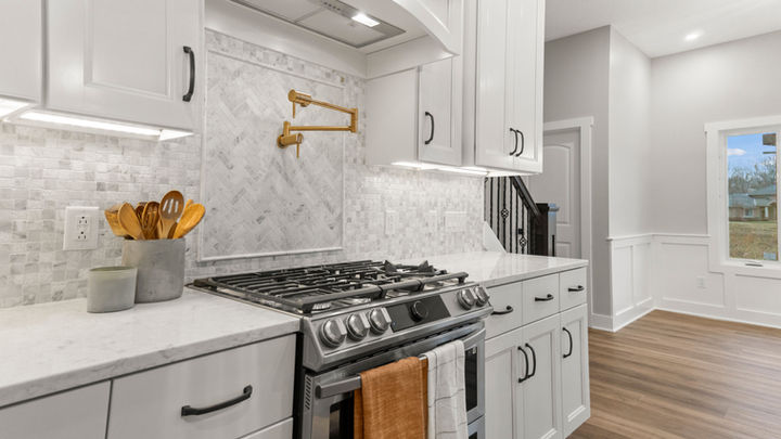 quality crafted homes - cedar wood retreat - custom home builder - custom homebuilders in Fort Wayne - custom kitchen - white kitchen - white kitchen cabinets - Indiana - midwest homes - Fort Wayne real estate - Fort Wayne homebuilders