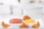 Low sodium ketchup and mustard on a tray with dinosaur shaped chicken nuggets