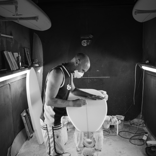 Luke Young shaping surfboard