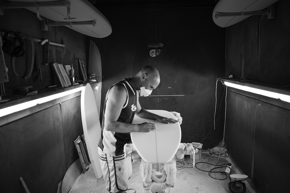 Luke Young adding finishing touches to a custom board
