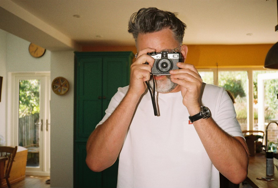 Me holding the Pentax 17 shot from a retro point and shoot using Kodak Colourplus film