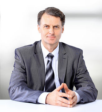 Portrait of a man in suit and tie