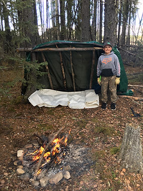 Boy is showing of his building skills.