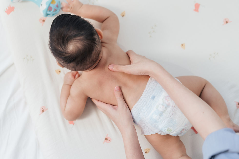 Top view, Baby back massage for stimulate development by mother Mother makes massage for h