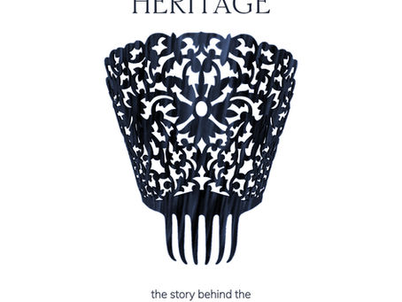 A stylized cover graphic featuring an ornate, black filigree Spanish peineta hair comb centered on a white background. Above it appears the title “Adornment as Heritage,” and below it reads “the story behind the Spanish peineta.”