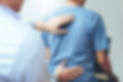 Doctor consulting with patient Back prob