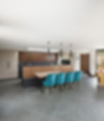 Banquette seating integrated in to luxury kitchen island.