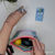 Trousse plume de paon turquoise