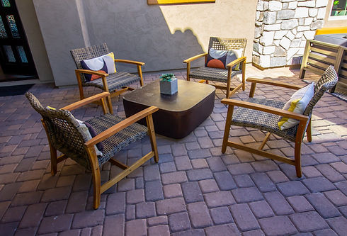 Front Home Patio Area With Four Wooden Chairs.jpg