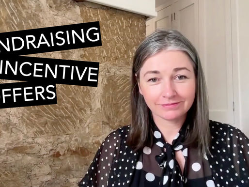 Dr Cassandra Chapman in front of a brick wall