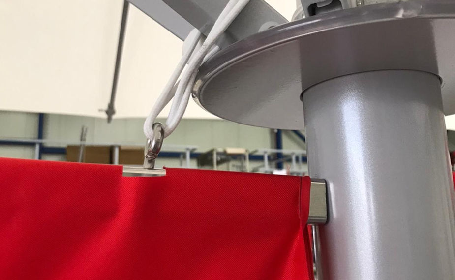 fixation au sol pour un maintien contre la vent sur votre parasol