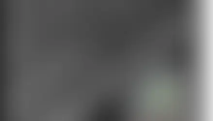 Figure | Optical Tellegen metasurface design. Scanning electron microscopy (SEM) images of a fabricated optical Tellegen metasurface, including a magnified view of an individual meta-atom, artificially colored to highlight the cobalt and silicon regions exhibiting single-domain vertical magnetization Ms.