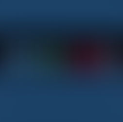 Tuning light at the nanoscale: Photographed under 365-nm UV light, these vials display the distinctive luminescence of lanthanide-doped nanocrystals. The shifting palette from blue and green to red and near-white captures how engineered energy landscapes translate into precise, tunable emission across the visible spectrum.