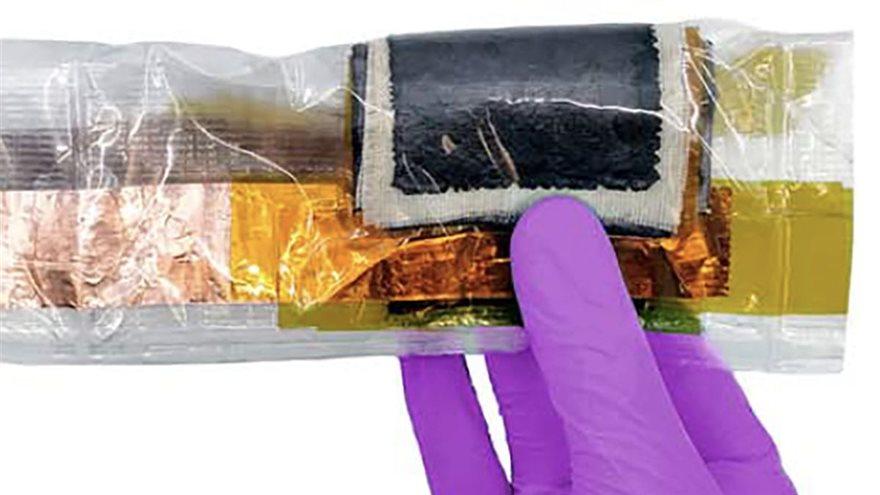 A flexible textile supercapacitor patch, created by Drexel University researchers, can power a microcontroller and wirelessly transmit temperature data for nearly two hours without a recharge. @ Drexel University