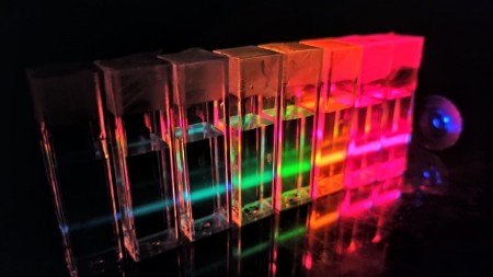 Cadmium telluride (CdTe) quantum dots of different sizes emitting light in response to excitation by UV laser. @ Pedro Felipe Garcia Martins da Costa