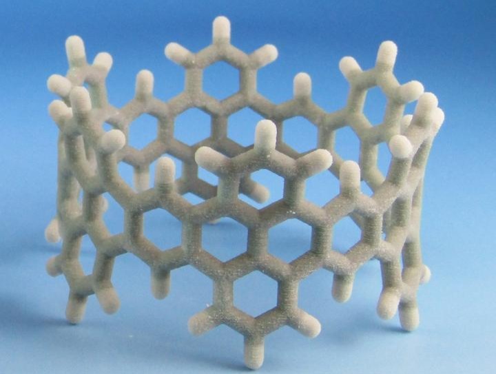 A model of the zigzag carbon nanobelt (with a magnification of 50 million) produced by a 3D printer at the Equipment Development Center, Institute for Molecular Science. @ NINS/IMS