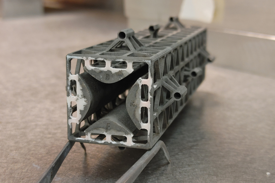 This photo shows an example of a 3D printed miniaturized quadrupole mass filter. They can be fabricated in a matter of hours for a few dollars. @ MIT