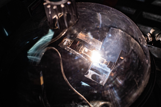 A flash signifies the creation of graphene from waste in the Tour lab. @ Jeff Fitlow