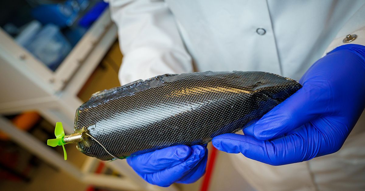 This miniature boat is built from a structural supercapacitor—a material that provides both structural support and energy storage capabilities. @ David Baillot/UC San Diego Jacobs School of Engineering