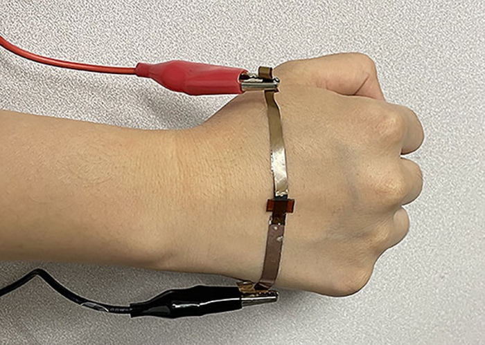 Huanyu "Larry" Cheng, Dorothy Quiggle Career Development Professor in Penn State's Department of Engineering Science and Mechanics, is leading research on flexible graphene devices made with lasers, like the wearable pressure sensor shown here. @ Huanyu Cheng, Penn State
