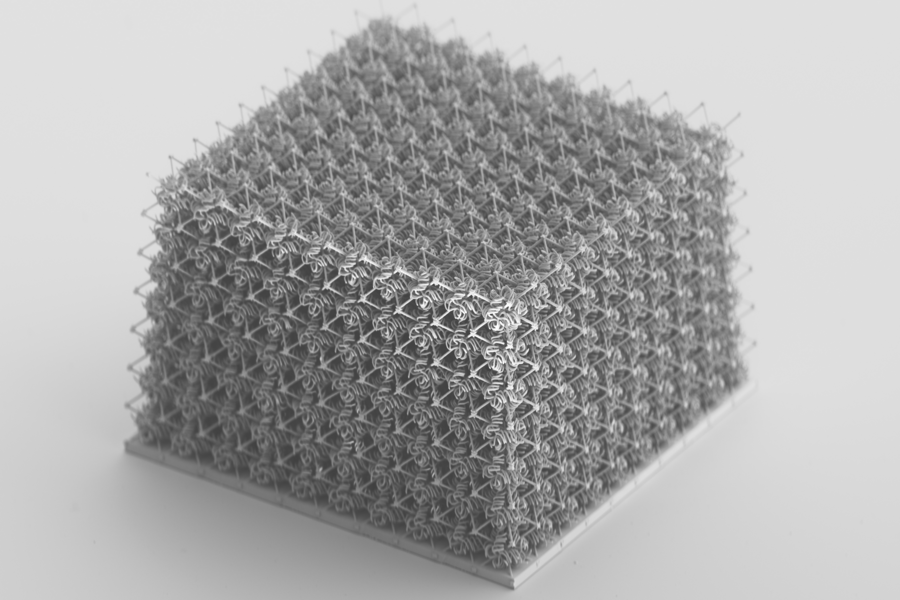 MIT engineers have now found a way to fabricate a metamaterial that is both strong and stretchy. The base material is typically highly rigid and brittle, but it is printed in precise, intricate patterns that form a structure that is both strong and flexible. @ MIT