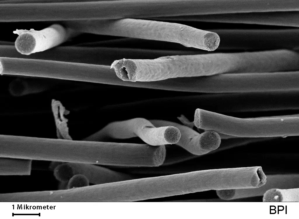 Scanning electron image of fibers in a novel electrospun nonwoven which exhibits an unusual combination of high electrical conductivity and extremely low thermal conductivity. @ UBT