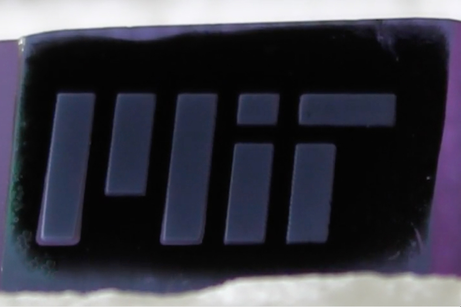 MIT engineers fabricate a forest of “white graphene” nanotubes (shown here patterned as MIT) by burning away a scaffold of black carbon. @ MIT