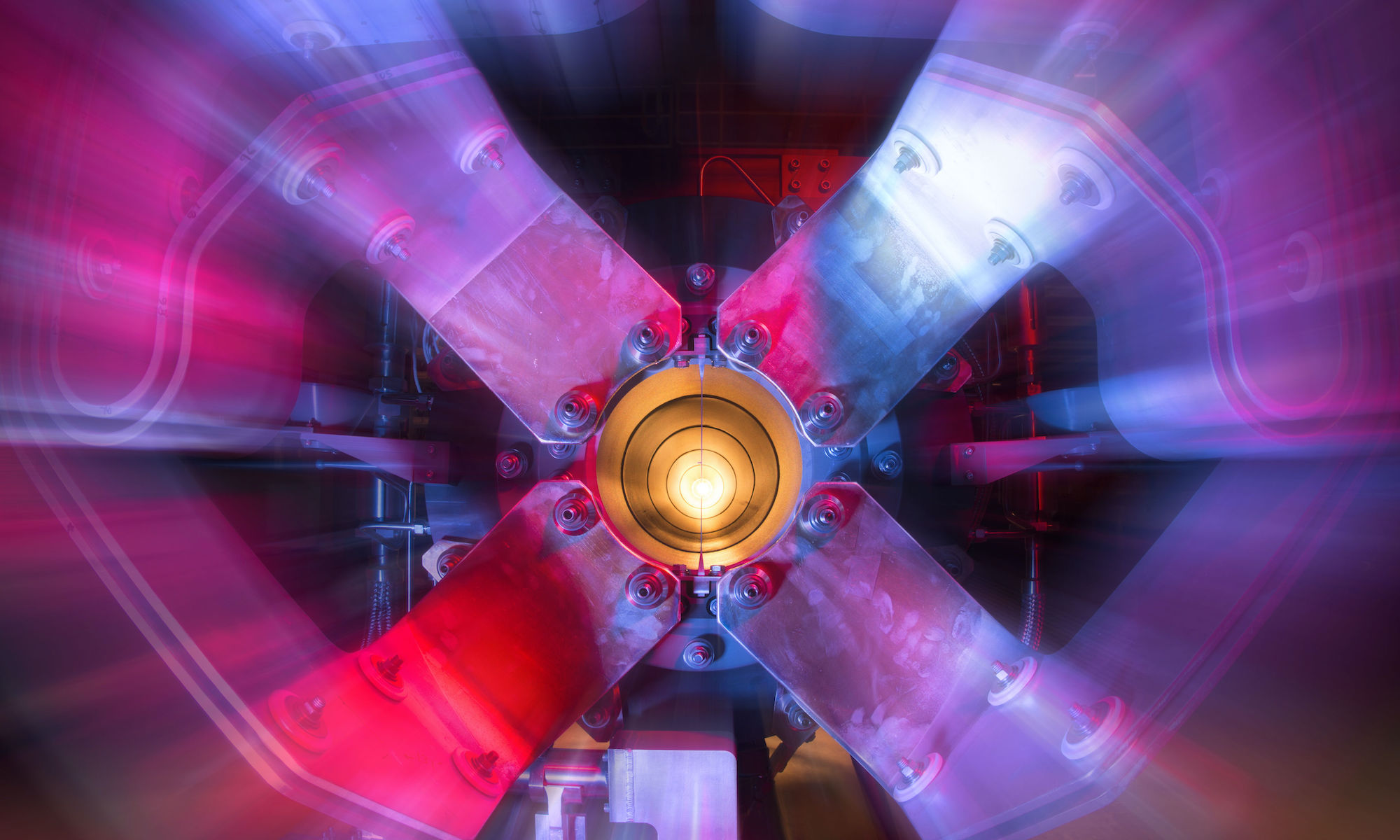 Rochester researchers used a particle accelerator at Fermilab—a portion of which is shown in a stylized image above—to create a beam of neutrinos to investigate the structure of protons. The work was part of the MINERvA experiment, an international collaboration to study neutrinos. @ Reidar Hahn/Fermilab