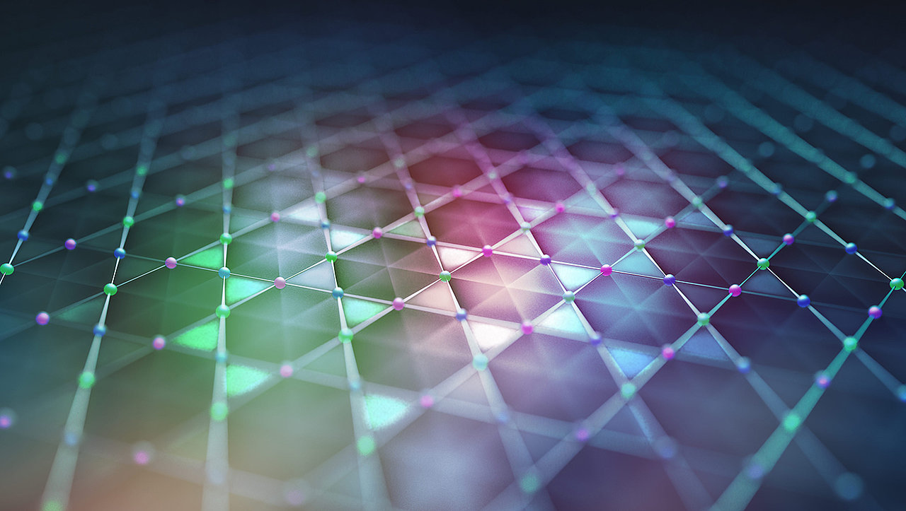 The kagome lattice is composed of three interwoven triangular lattices. For KV3Sb5, each such triangular lattice (denoted red, blue, and green) represent one type of Vanadium sublattice which together form the Kagome metal. The particular kagome lattice structure leads to intriguing quantum effects which yields collective electronic quantum states such as a potentially unprecedented form of superconductivity. @ Pixelwg Jörg Bandmann / ct.qmat