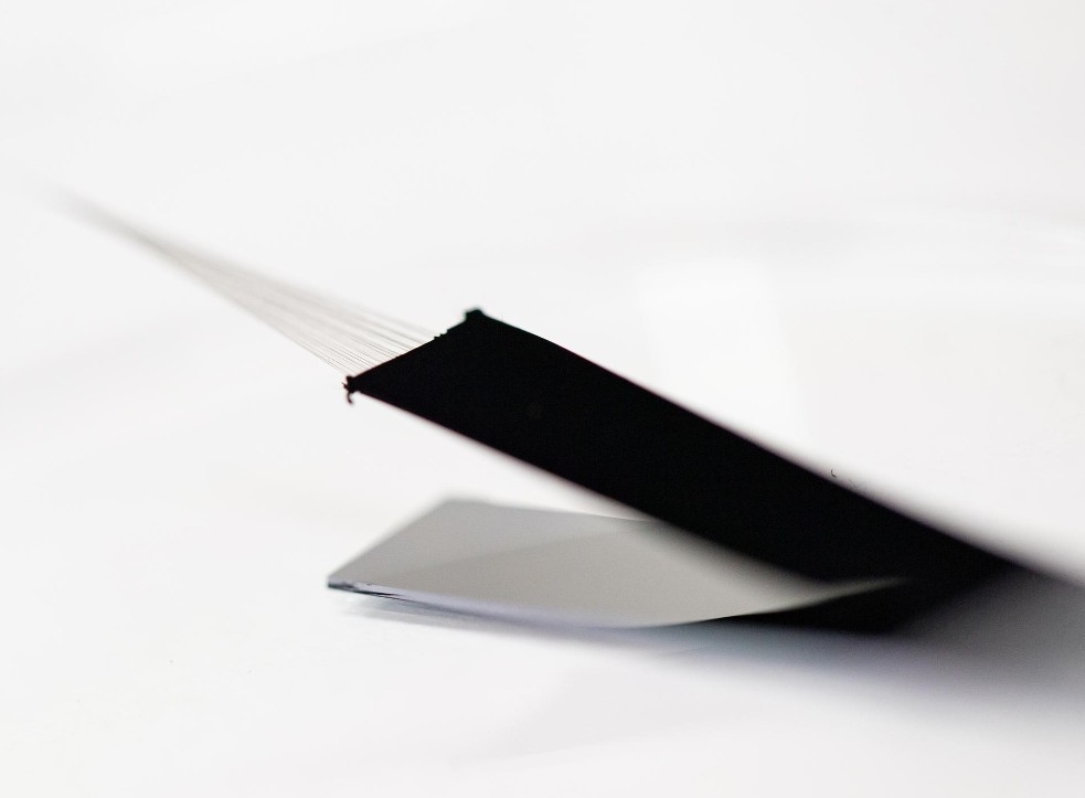 Carbon nanotubes are used to create the blackest synthetic material on Earth, absorbing more than 99% of all light. Nanotube fibers are strong and lightweight. @ Andrew Higley/UC Marketing + Brand