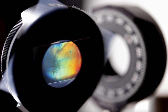 This composite film can twist light into a spiral, thanks to microscopic grooves that cause horizontally and vertically oscillating light waves to pass through the film out of phase. Unlike existing materials that can do this, the film maintains its light-twisting properties when heated up to 250 degrees Celsius. @ Brenda Ahearn, Michigan Engineering