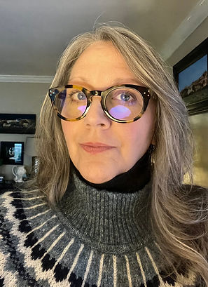 Diane Wood showcases her calm demeanor, representing wellness retreats in her work.