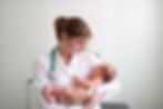 Nurse Holding Baby_edited.jpg