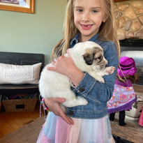 Grace hold puppy Easter.jpg