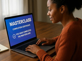a black lady sitting at a laptop learning a masterclass