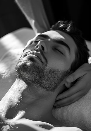 monochrome-portrait-man-getting-massage.jpg