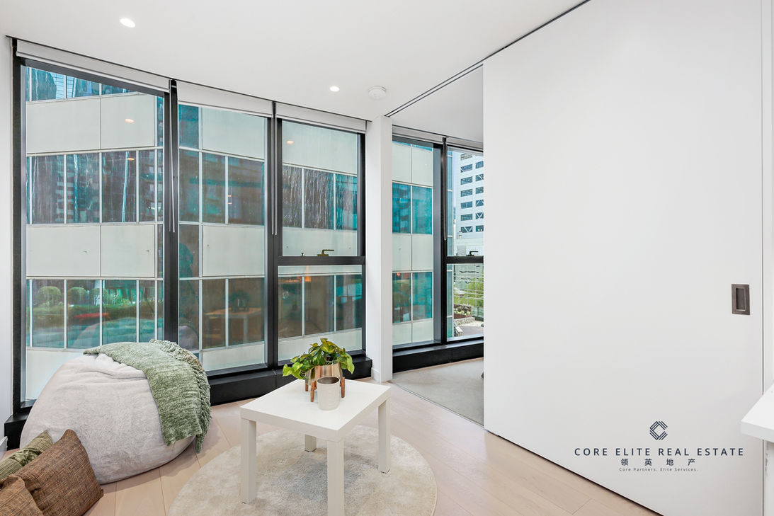 Bright open-plan living & dining area with full-height windows