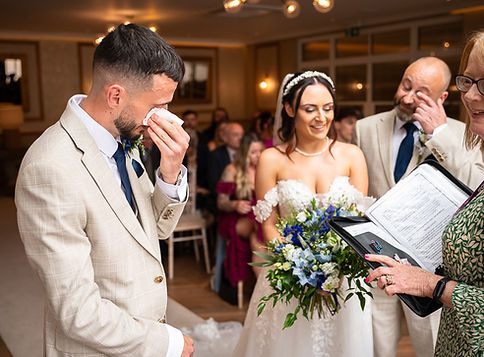 Groom crying and father of bride crying at the top of the aisle. Nice intimate photo..JPG