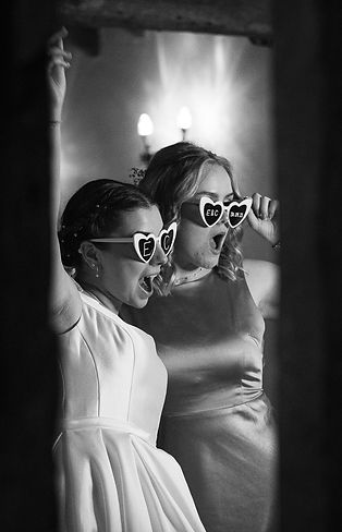 Bride and her bridesmaid cheering..JPG