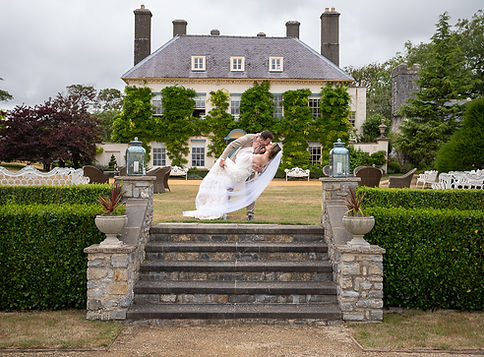 Groom dipping bride for a kiss. Gilestone Manor wedding venue..JPG
