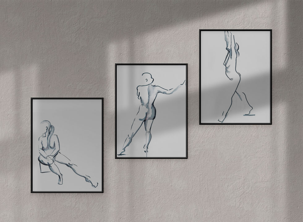 Three minimalist line drawings of human figures on display.