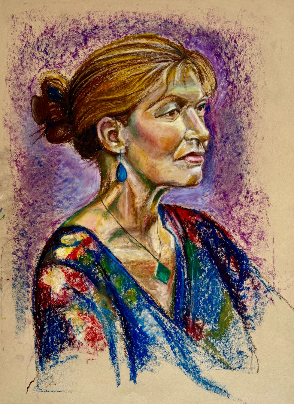 Colorful portrait of a woman with earrings and necklace.