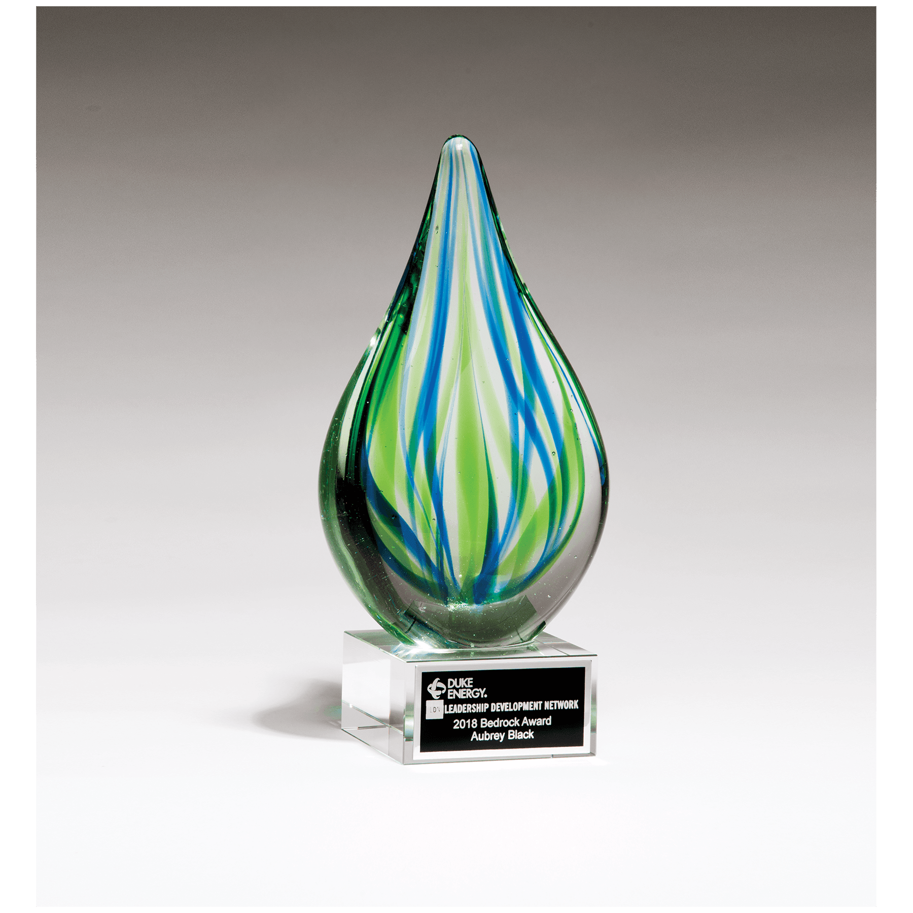 8" Blue and Green Teardrop Art Glass on Clear Glass Base with Black Laserable Al