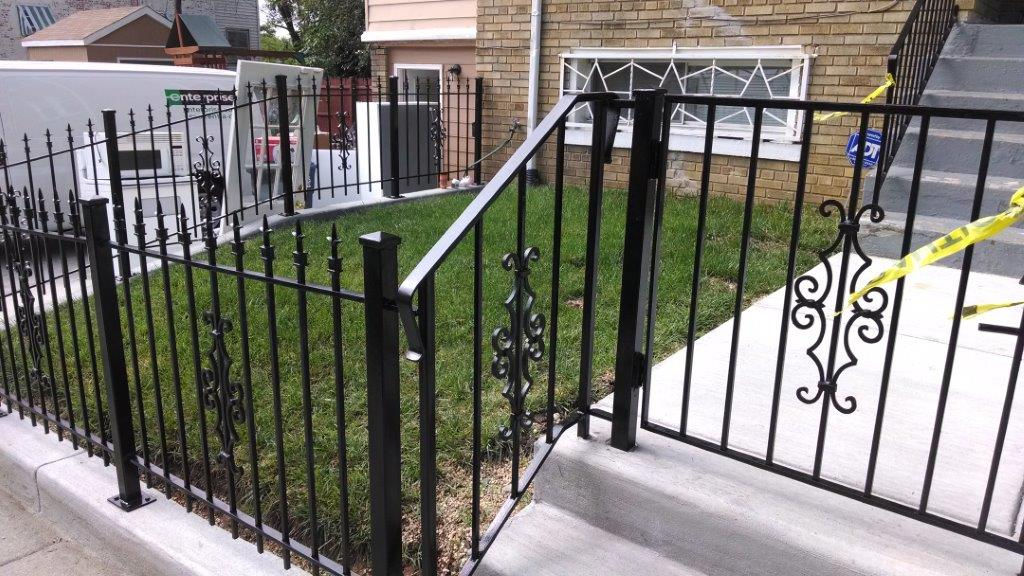 Residential wrought iron fence and handrail