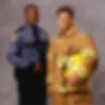 Police officer and firefighter standing together, Rachiele. About Us. Public safety professionals.