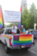 Kinship members participating in a local pride parade