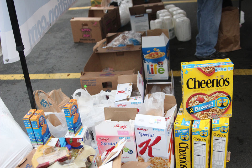 Cereal boxes and bags on a table, Life, Cheerios, Special K Food Distribution.