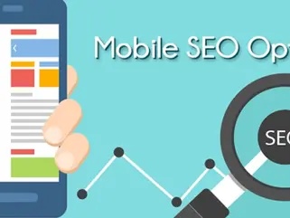 Cell phone store owner optimizing Google Business Profile for local SEO on laptop